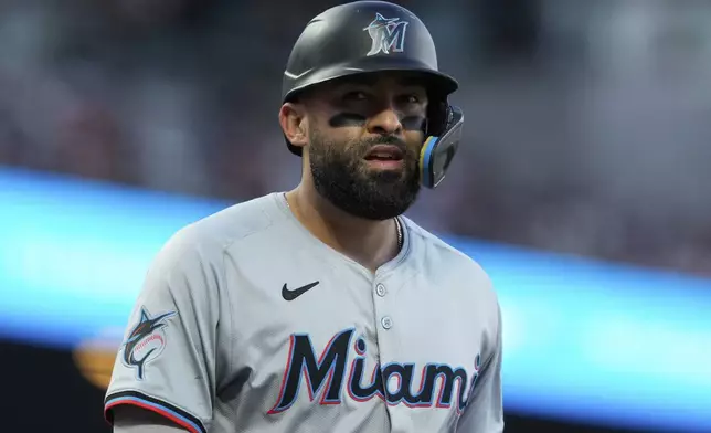 Miami Marlins' Ali Sánchez walks to the dugout after being called out on strikes during the fifth inning of a baseball game against the San Francisco Giants, Saturday, Aug. 31, 2024, in San Francisco. (AP Photo/Godofredo A. Vásquez)