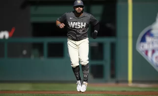 Washington Nationals' Juan Yepez takes a lead from first base during the first inning of a baseball game against the Miami Marlins, Saturday, Sept. 14, 2024, in Washington. (AP Photo/Nick Wass)