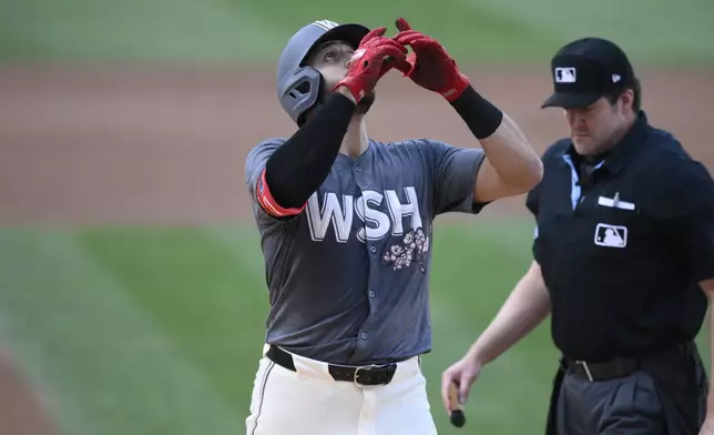 Washington Nationals' Joey Gallo celebrates his home run during the second inning of a baseball game against the Miami Marlins, Saturday, Sept. 14, 2024, in Washington. (AP Photo/Nick Wass)