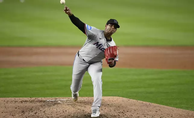 Miami Marlins starting pitcher Edward Cabrera throws during the second inning of a baseball game against the Washington Nationals, Friday, Sept. 13, 2024, in Washington. (AP Photo/Nick Wass)