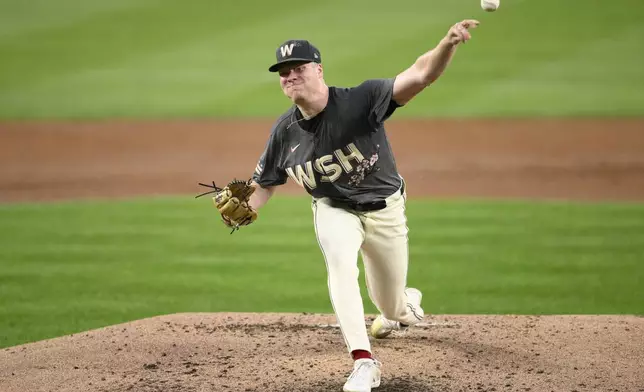 Washington Nationals starting pitcher DJ Herz throws during the second inning of a baseball game against the Miami Marlins, Friday, Sept. 13, 2024, in Washington. (AP Photo/Nick Wass)