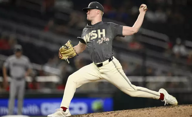 Washington Nationals starting pitcher DJ Herz throws during the fourth inning of a baseball game against the Miami Marlins, Friday, Sept. 13, 2024, in Washington. (AP Photo/Nick Wass)