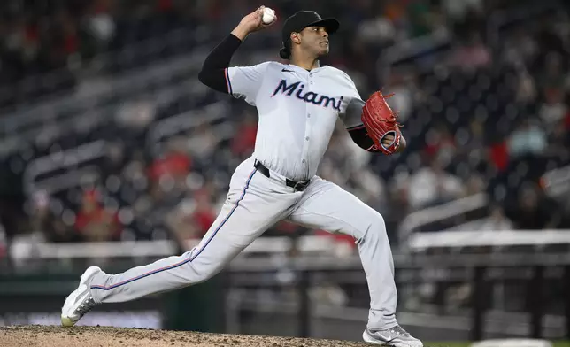 Miami Marlins starting pitcher Edward Cabrera throws during the fifth inning of a baseball game against the Washington Nationals, Friday, Sept. 13, 2024, in Washington. (AP Photo/Nick Wass)