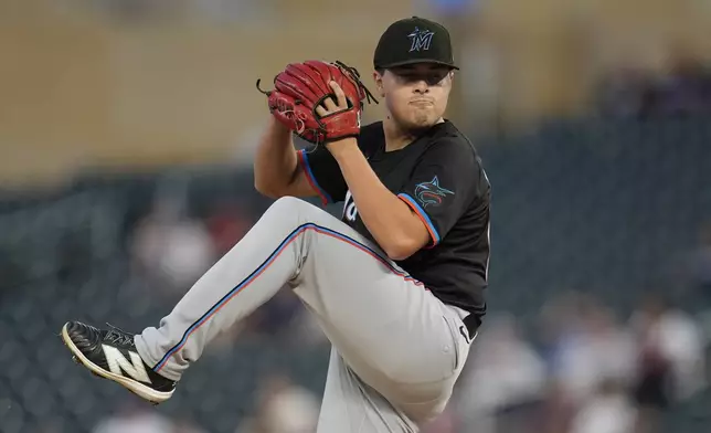 Miami Marlins starting pitcher Valente Bellozo winds up to deliver during the first inning of a baseball game against the Minnesota Twins, Thursday, Sept. 26, 2024, in Minneapolis. (AP Photo/Abbie Parr)