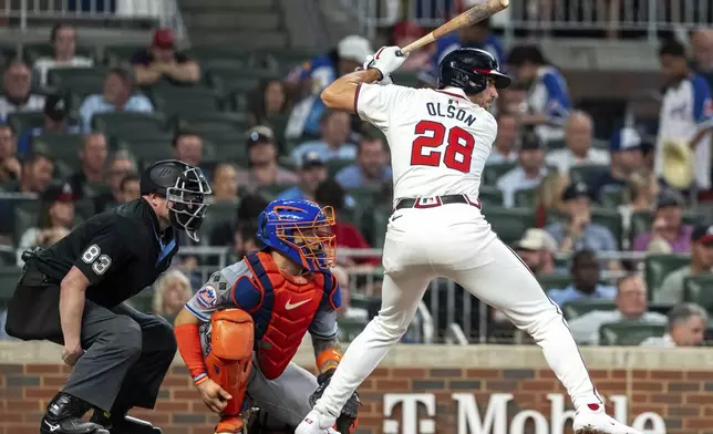 Atlanta Braves' Matt Olson (28) watches a pitch in the fifth inning of a baseball game against the New York Mets, Tuesday, Sept. 24, 2024, in Atlanta. (AP Photo/Jason Allen)