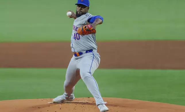 New York Mets pitcher Luis Severino throws in the first inning of a baseball game against the Atlanta Braves, Tuesday, Sept. 24, 2024, in Atlanta. (AP Photo/Jason Allen)