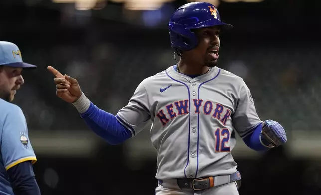 New York Mets' Francisco Lindor gestures to an umpire during the first inning of a baseball game against the New York Mets, Friday, Sept. 27, 2024, in Milwaukee. (AP Photo/Aaron Gash)