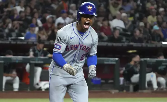 New York Mets' Francisco Lindor reacts after hitting a solo home run against the Arizona Diamondbacks in the sixth inning during a baseball game, Thursday, Aug 29, 2024, in Phoenix. (AP Photo/Rick Scuteri)