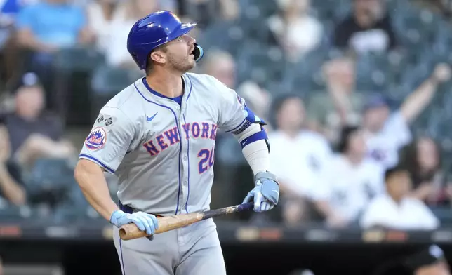 New York Mets' Pete Alonso watches his two-run home run off Chicago White Sox starting pitcher Davis Martin during the first inning of a baseball game Saturday, Aug. 31, 2024, in Chicago. (AP Photo/Charles Rex Arbogast)