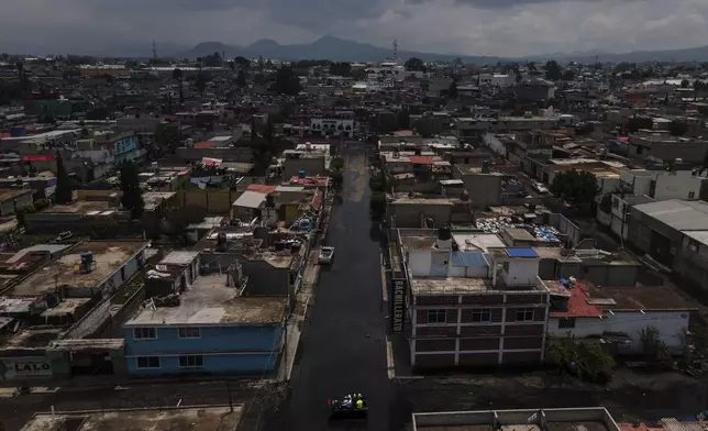 Sewage-infused flooding affects Valle de Chalco, State of Mexico, Thursday, Aug. 29, 2024. (AP Photo/Felix Marquez)