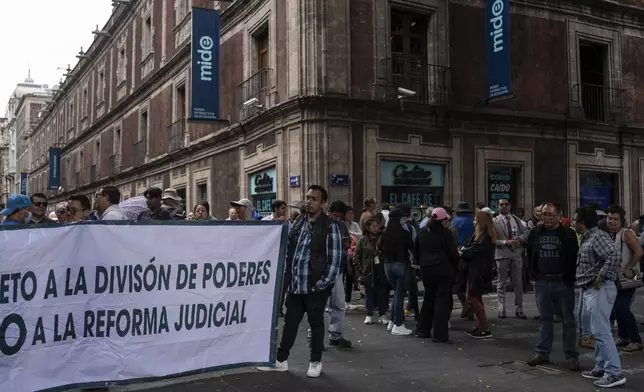 Judiciary workers protest judicial reform outside the Mexico city Congress, Thursday, Sept. 12, 2024. (AP Photo/Felix Marquez)