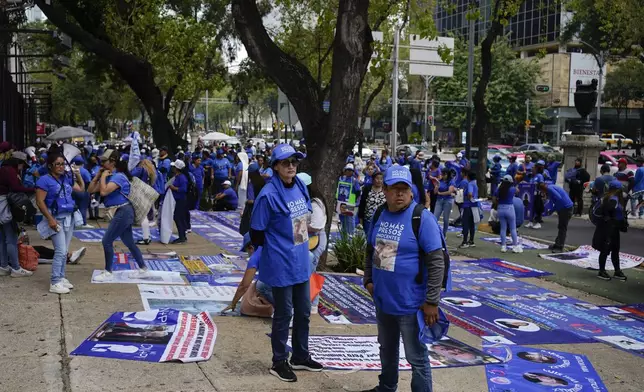 Relatives of prisoners gather in favor of the government's proposed judicial reform in Mexico City, Wednesday, Sept. 4, 2024. (AP Photo/Felix Marquez)