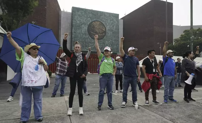 Judicial workers block entrances of Congress to protest constitutional reform proposals that would make judges stand for election in Mexico City, Tuesday, Sept. 3, 2024. (AP Photo/Felix Marquez)