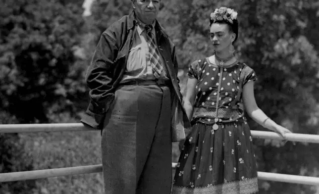 FILE - Mexican muralist Diego Rivera and Frida Kahlo photographed on a balcony at their home in Mexico City, April 13, 1939. (AP Photo, File)