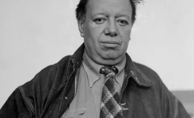 FILE - Mexican artist Diego Rivera poses for a photo in Mexico City, April 14, 1939. In the 1940s, Rivera built the Anahuacalli Museum to preserve and display his lifelong collection of pre-Hispanic art. (AP Photo, File)