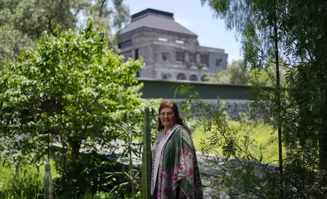 María Teresa Moya, director of the Anahuacalli Museum, poses for a photo on museum grounds in Mexico City, Tuesday, Aug. 20, 2024. Built by Mexican artist Diego Rivera to preserve and display his lifelong collection of pre-Hispanic art, the museum is celebrating its 60th anniversary. (AP Photo/Eduardo Verdugo)