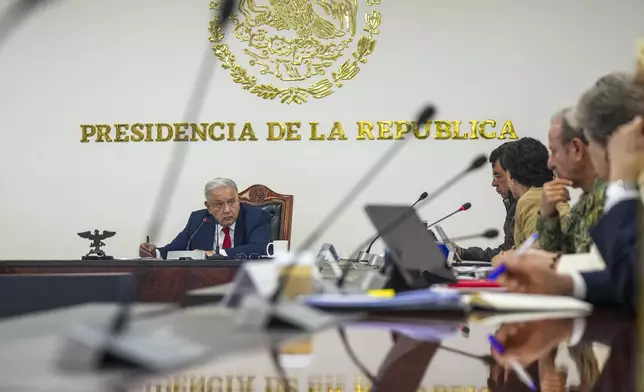 FILE - Mexican President Andres Manuel Lopez Obrador meets with his security cabinet at the National Place in Mexico City, Aug. 2, 2024. (AP Photo/Fernando Llano, File)