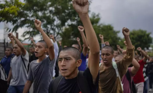 Classmates of the 43 Ayotzinapa students who went missing almost 10 years ago march to demand justice for their loved ones in Chilpancingo, Mexico, Wednesday, Sept. 18, 2024. (AP Photo/Felix Marquez)