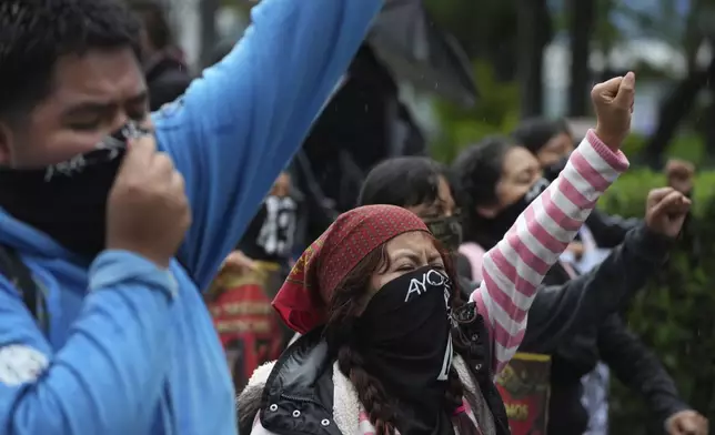 Families and friends take part in a demonstration marking the 10-year anniversary of the disappearance of 43 students from an Ayotzinapa rural teacher's college, in Mexico City, Thursday, Sept. 26, 2024. (AP Photo/Fernando Llano)