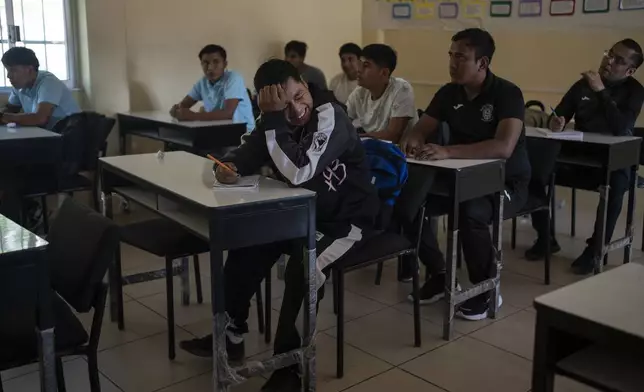 Erick de la Cruz jokes around on the first day of class at the Raúl Isidro Burgos Rural Normal School in Ayotzinapa, Guerrero state, Mexico, Monday, Aug. 26, 2024. (AP Photo/Felix Marquez)