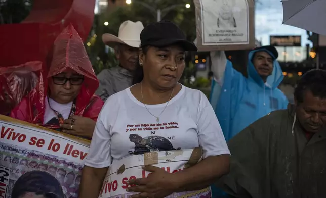 Luz María Telumbre, whose son Christian is one of 43 missing students from the Raúl Isidro Burgos Rural Normal School, protests for justice in the 10-year case in Mexico City, Monday, Aug. 26, 2024. (AP Photo/Felix Marquez)