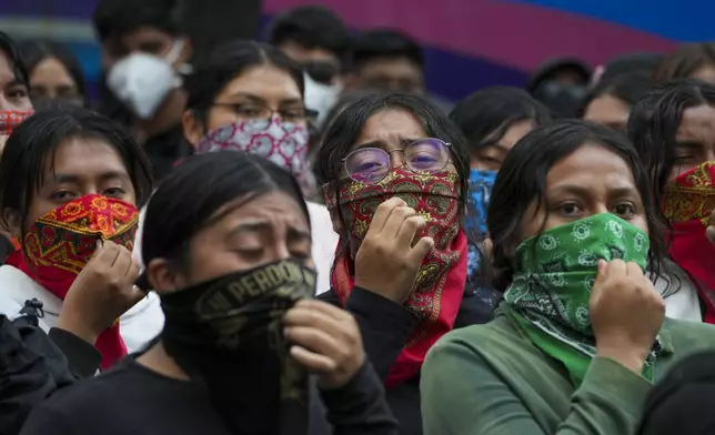 Students demonstrate ahead of the 10th anniversary of the disappearance of 43 Ayotzinapa students in Guerrero state, outside of the Senate in Mexico City, Tuesday, Sept. 24, 2024. (AP Photo/Fernando Llano)