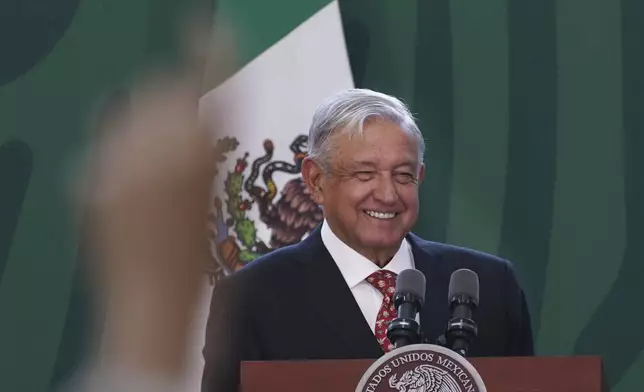 FILE - Mexican President Andres Manuel Lopez Obrador speaks during his daily morning press conference before officially inaugurating the Felipe Angeles International Airport (AIFA) north of Mexico City, March 21, 2022. (AP Photo/Marco Ugarte, File)