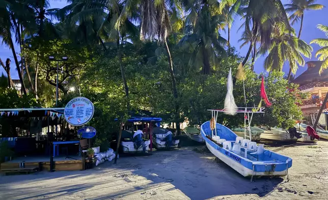 Boats are stored on the beach for protection ahead of the anticipated arrival of Tropical Storm John in Puerto Escondido, Mexico, Monday, Sept. 23, 2024. (AP Photo/Luis Alberto Cruz)