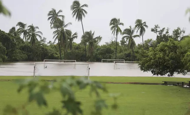 A soccer field sits partially submerged by floodwaters in the aftermath of Hurricane John, in Acapulco, Mexico, Friday, Sept. 27, 2024. (AP Photo/Bernardino Hernandez)