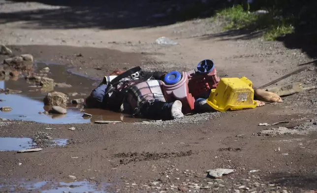 Bodies lie on the ground in Culiacan, Sinaloa state, Mexico, Tuesday, Sept. 17, 2024. (AP Photo)