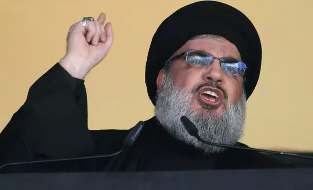 FILE - In this Oct. 24, 2015 file photo, Hezbollah leader Sheik Hassan Nasrallah addresses a crowd during the holy day of Ashoura, in a southern suburb of Beirut, Lebanon. (AP Photo/Hassan Ammar, File)