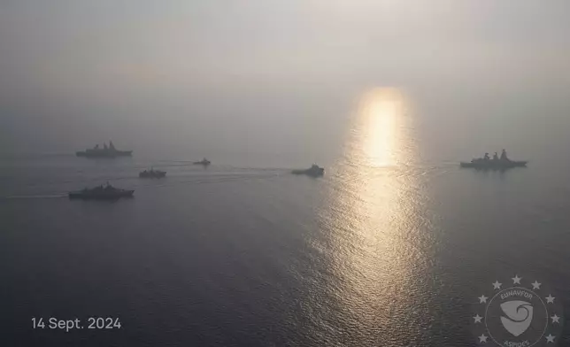 This photo released by the European Union’s Operation Aspides shows warships attached to the mission escorting salvage ships in the Red Sea on Saturday, Sept. 14, 2024. A new attempt has begun to try to salvage an oil tanker burning in the Red Sea after attacks by Yemen’s Houthi rebels, a European Union naval mission said Saturday. (European Union's Operation Aspides via AP)