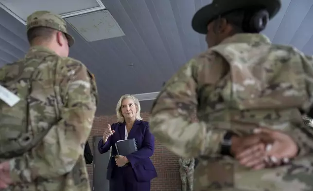 Army Secretary Christine Wormuth talks with soldiers at Fort Jackson, a U.S. Army Training Center, Wednesday, Sept. 25, 2024, in Columbia, S.C. (AP Photo/Chris Carlson)