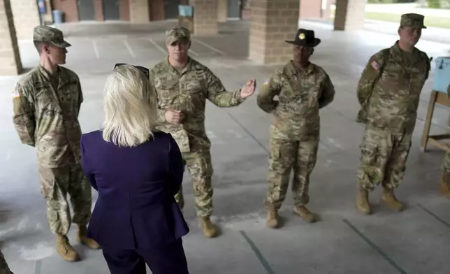 Army Secretary Christine Wormuth talks with soldiers at Fort Jackson, a U.S. Army Training Center, Wednesday, Sept. 25, 2024, in Columbia, S.C. (AP Photo/Chris Carlson)