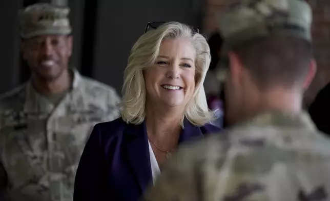 Army Secretary Christine Wormuth talks with soldiers at Fort Jackson, a U.S. Army Training Center, Wednesday, Sept. 25, 2024, in Columbia, S.C. (AP Photo/Chris Carlson)