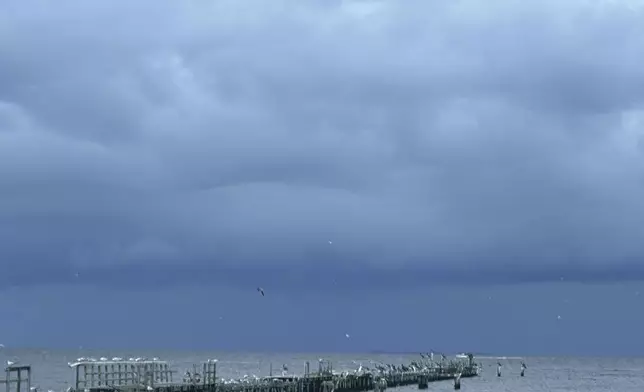 Weather begins to form from Tropical Storm Francine on the Harrison County Beaches in Pass Christian, Miss. Monday, Sept. 9, 2024. (Hunter Dawkins/The Gazebo Gazette via AP)