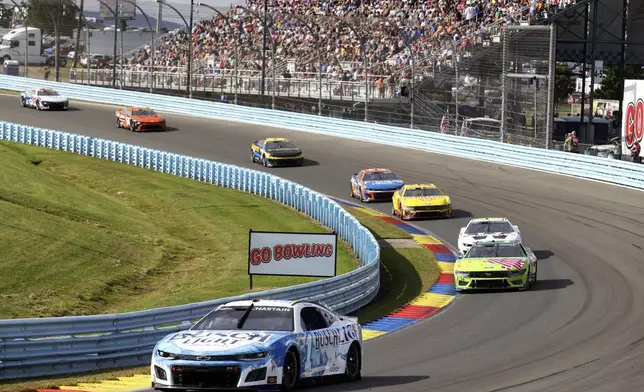 Ross Chasten (1) competes during a NASCAR Cup Series auto race, Sunday, Sept. 15, 2024, in Watkins Glen, N.Y. (AP Photo/Lauren Petracca)