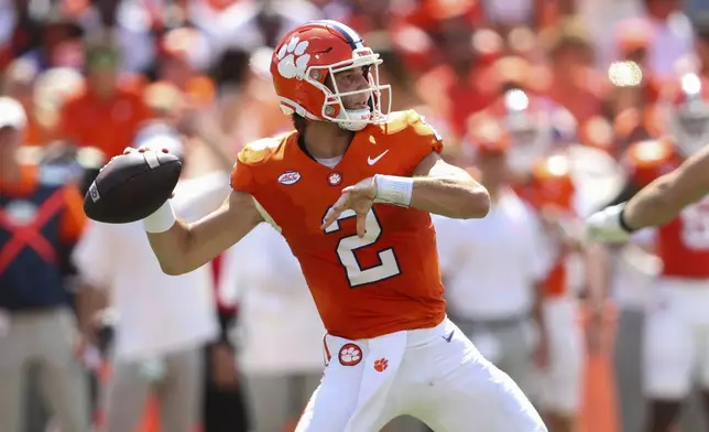 Clemson quarterback Cade Klubnik (2) throws a pass during the first half of an NCAA college football game against North Carolina State Saturday, Sept. 21, 2024, in Clemson, S.C. (AP Photo/Artie Walker Jr.)