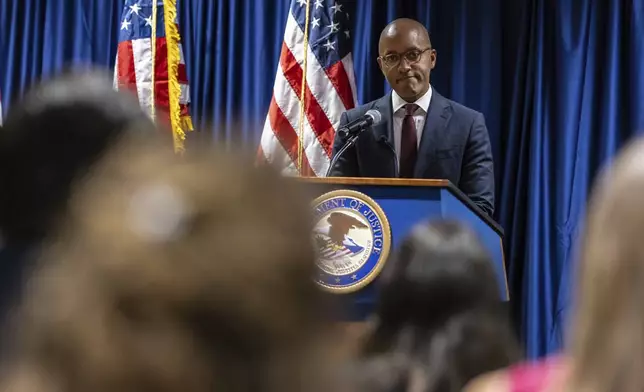 Damian Williams, U.S. Attorney for the Southern District of New York, speaks at a press conference at Federal Plaza in New York, Monday Sept. 16, 2024, following the arrest of two former New York City Fire Department chiefs. (AP Photo/Stefan Jeremiah)