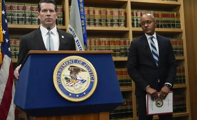 James Dennehy, FBI New York Assistant Director in Charge, left, speaks at a news conference detailing an indictment against New York City Mayor Eric Adams as U.S. Attorney Damian Williams looks on, Thursday, Sept. 26, 2024, in New York. (AP Photo/Julia Demaree Nikhinson)