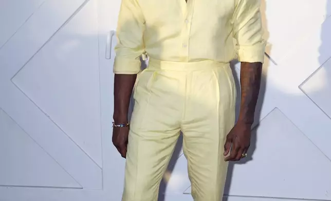 Usher attends the Ralph Lauren Spring/Summer 2025 fashion show as part of New York Fashion Week on Thursday, Sept. 5, 2024, at Khalily Stables in Bridgehampton, N.Y. (Photo by Charles Sykes/Invision/AP)