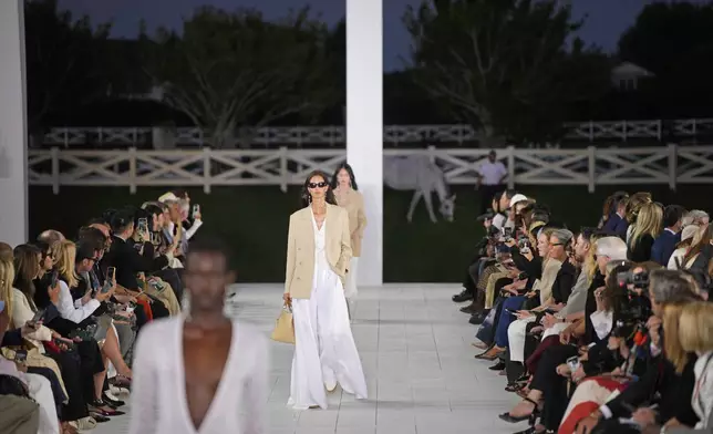 Models walks the runway during the Ralph Lauren Spring/Summer 2025 fashion show as part of New York Fashion Week on Thursday, Sept. 5, 2024, at Khalily Stables in Bridgehampton, N.Y. (Photo by Charles Sykes/Invision/AP)