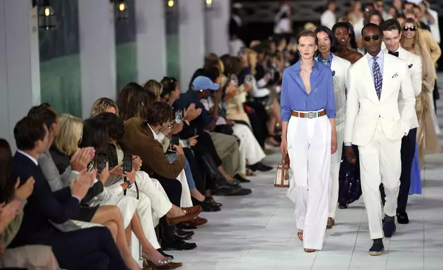 Models walk the runway during the Ralph Lauren Spring/Summer 2025 fashion show as part of New York Fashion Week on Thursday, Sept. 5, 2024, at Khalily Stables in Bridgehampton, N.Y. (Photo by Charles Sykes/Invision/AP)