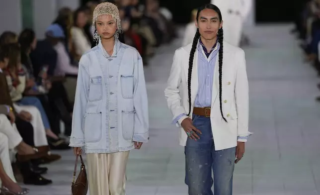 Models walk the runway during the Ralph Lauren Spring/Summer 2025 fashion show as part of New York Fashion Week on Thursday, Sept. 5, 2024, at Khalily Stables in Bridgehampton, N.Y. (Photo by Charles Sykes/Invision/AP)