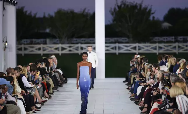 Models walk the runway during the Ralph Lauren Spring/Summer 2025 fashion show as part of New York Fashion Week on Thursday, Sept. 5, 2024, at Khalily Stables in Bridgehampton, N.Y. (Photo by Charles Sykes/Invision/AP)