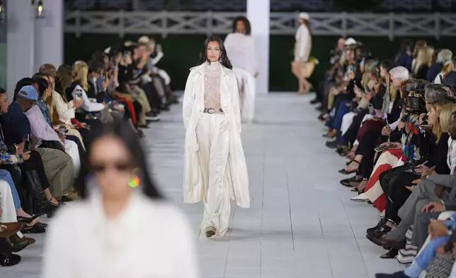 Models walk the runway during the Ralph Lauren Spring/Summer 2025 fashion show as part of New York Fashion Week on Thursday, Sept. 5, 2024, at Khalily Stables in Bridgehampton, N.Y. (Photo by Charles Sykes/Invision/AP)