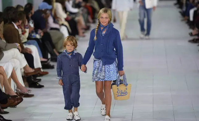 Models walk the runway during the Ralph Lauren Spring/Summer 2025 fashion show as part of New York Fashion Week on Thursday, Sept. 5, 2024, at Khalily Stables in Bridgehampton, N.Y. (Photo by Charles Sykes/Invision/AP)