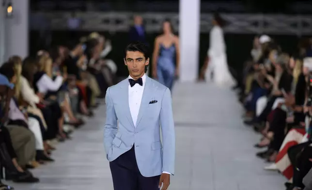 Models walk the runway during the Ralph Lauren Spring/Summer 2025 fashion show as part of New York Fashion Week on Thursday, Sept. 5, 2024, at Khalily Stables in Bridgehampton, N.Y. (Photo by Charles Sykes/Invision/AP)