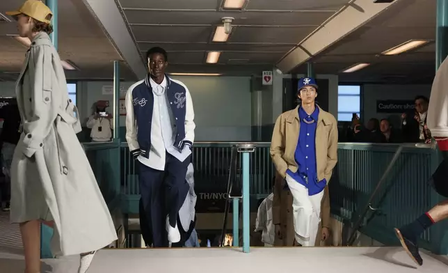 Models walk the runway during the Tommy Hilfiger Spring/Summer 2025 fashion show onboard a Staten Island Ferry as part of New York Fashion Week on Sunday, Sept. 8, 2024, in New York. (Photo by Charles Sykes/Invision/AP)