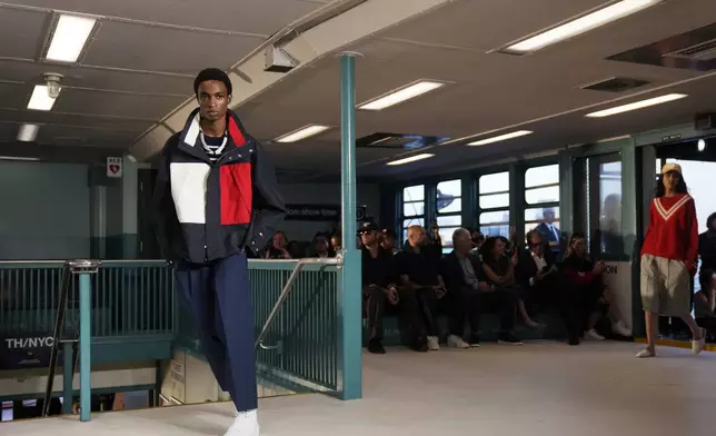 Models walk the runway during the Tommy Hilfiger Spring/Summer 2025 fashion show onboard a Staten Island Ferry as part of New York Fashion Week on Sunday, Sept. 8, 2024, in New York. (Photo by Charles Sykes/Invision/AP)